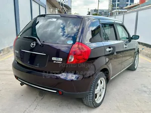 Mazda Verisa 2009 Maroon