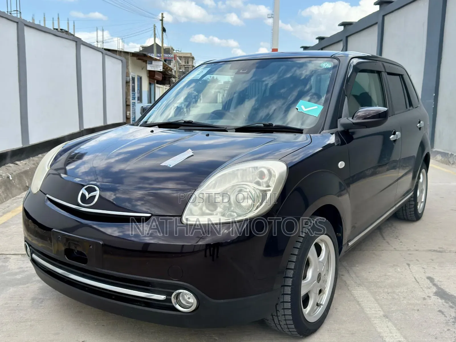 Mazda Verisa 2009 Maroon