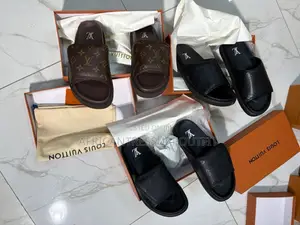 Louis Vuitton Slides Sandals Featuring Iconic Monogram Canvas Cross On