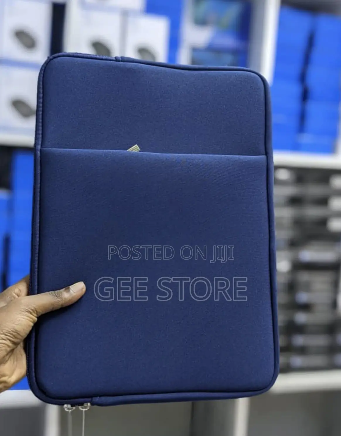 Dark Blue Neoprene Laptop Sleeve With a Front Accessory Pocket.