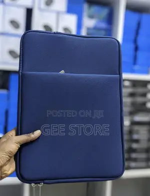 Dark Blue Neoprene Laptop Sleeve With a Front Accessory Pocket.