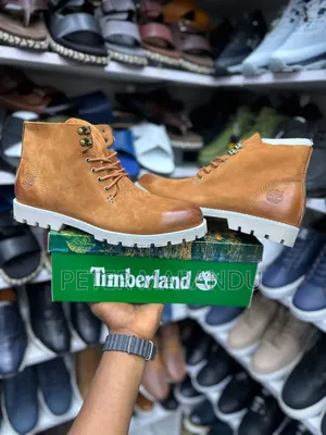 Timberland Boots Classic Available in Black and Brown".