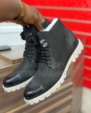 Timberland Boots Classic Available in Black and Brown".