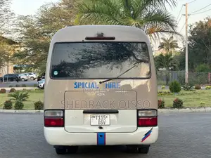 Toyota Coaster 1999 Gold