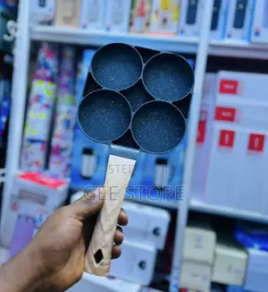 A 4-Hole Non-Stick Frying Pan