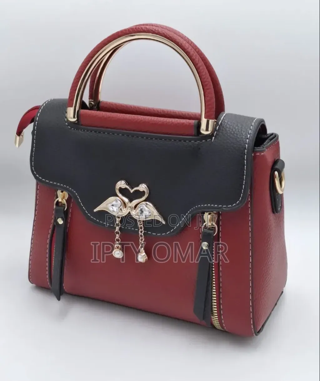 Red and Black Handbag With Swan Clasp