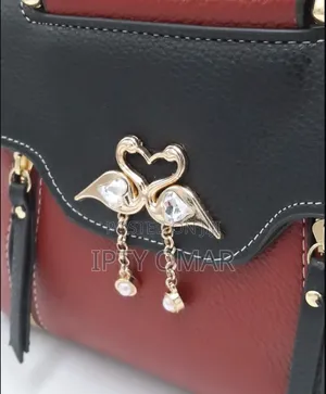 Red and Black Handbag With Swan Clasp