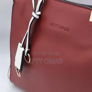Red and White Handbag With Gold Accents